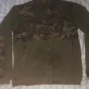 Green and black camo north face jacket